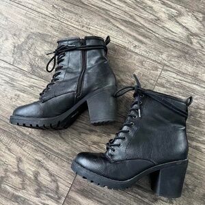 Black heeled combat boots